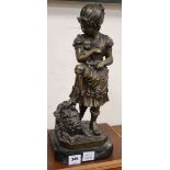 A modern bronze of a girl with a dog and puppies, height 51cm