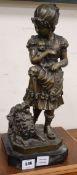A modern bronze of a girl with a dog and puppies, height 51cm