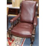 A burgundy leather upholstered Victorian mahogany library chair, W.70cm, D.84cm, H.94cm