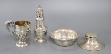 A group of small silver including a christening mug, sugar bowl, sugar caster, 16.4cm, and capstan