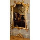 An 18th century style giltwood and gesso rectangular wall mirror, W.62cm, H.104cm. (frame in need of