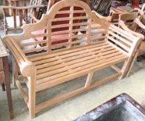 A Lutyens style teak garden bench, W.164cm, D.56cm, H.106cm