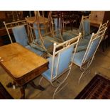 An enamelled metal dining suite comprising a circular glass-topped table and a set of eight