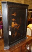 A George III chinoiserie lacquered hanging corner cabinet, W.63cm, D.35cm, H.78cm