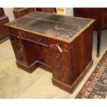 A George IV mahogany kneehole desk, with recessed cupboard, W.115cm, D.60cm, H.76cmCONDITION: The