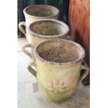 Three circular earthenware garden planters, 30cm diameter, H.29cm