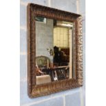 A giltwood and gesso rectangular acanthus framed wall mirror, 74 x 84cm