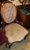 A Victorian walnut beige dralon spoon back nursing chair