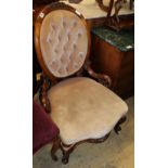 A Victorian walnut beige dralon spoon back nursing chair