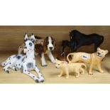 A Beswick black beauty and foal lioness and cub, two unnamed models of dogs, tallest 21cm