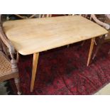 An Ercol rectangular elm dining table, W.134cm, D.70cm, H.70cm