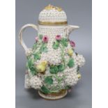 A Meissen floral encrusted hot water jug and cover, height 26cm