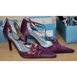 A pair of Karen Millen purple silk stiletto T strap shoes, decorated with leather flowers, size