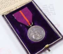 An OBE medal: First World War Ambulance Driver and an Ansley Gilbey Jubilee collection plate