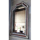 A Moroccan arched top wall mirror, W.70cm, H.108cm