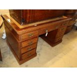 A late Victorian walnut pedestal desk, W.138cm, D.75cm, H.78cm