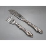 An ornate pair of Victorian pierced silver fish servers, Hilliard & Thomason, Birmingham, 1859,