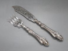An ornate pair of Victorian pierced silver fish servers, Hilliard & Thomason, Birmingham, 1859,