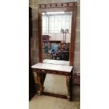 A George IV style marble topped parcel gilt rosewood console table with mirror back, W.80cm, D.33cm,