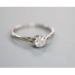 A white metal and solitaire diamond ring, size J/K, gross 2 grams, stone weighing approximately 0.