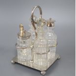 A modern silver cruet stand and four bottles, two with silver mounts, by Garrard & Co Ltd, London,