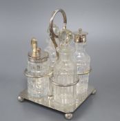 A modern silver cruet stand and four bottles, two with silver mounts, by Garrard & Co Ltd, London,