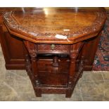 An 18th century style carved oak folding tea table, W.82cm, D.41cm, H.76cm