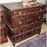 A 17th century style geometric moulded oak two part chest, W.100cm, D.58cm, H.96cm