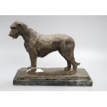 A resin figure of a hound, signed James Osborne, on marble base, height 21cm