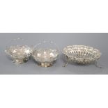 A pair of George V pierced silver bonbon baskets, Birmingham, 1913 and an Edwardian pierced silver