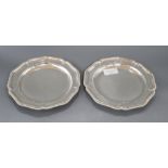 A pair of George IV silver shaped circular dinner plates, with gadrooned borders, Thomas Burwash,