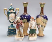 A pair of Doulton Slaters patent stoneware vases, Continental figures and a Vienna style urn and