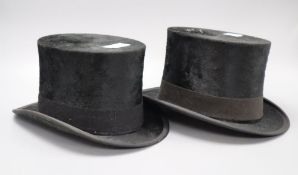 Two vintage black top hats, interior initialled AWL and AEL, length 19.5 width 15.5cm