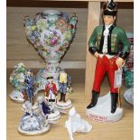 Three limited edition Michael Sutty figures, an 'Irish Mist' advertising figure, a Dresden style