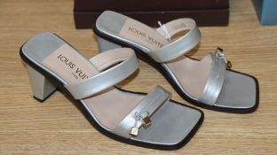 A pair of Louis Vuitton silver heeled sandals (boxed) size 37