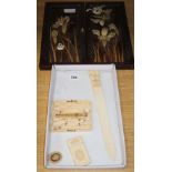 A Canton ivory card case, a page turner, a necessaire case and a pair of Japanese hardwood plaques