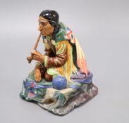 A Royal Doulton figure of Calumet HN1689 (1935-49)CONDITION: Pipe has been restored, the hand