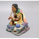 A Royal Doulton figure of Calumet HN1689 (1935-49)CONDITION: Pipe has been restored, the hand