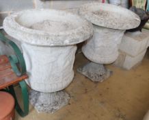 A pair of reconstituted stone Campana garden urns, 62cm diameter, H.80cm