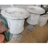 A pair of reconstituted stone Campana garden urns, 62cm diameter, H.80cm