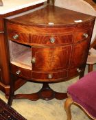 A Georgian mahogany bow front corner washstand, W.66cm, D.47cm, H.84cm