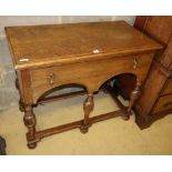 An early 20th century Queen Anne style oak side table, W.93cm, D.47cm, H.75cm