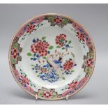 A Chinese Yongzheng famille rose dish, diameter 22cmCONDITION: Several small chips to the rim and