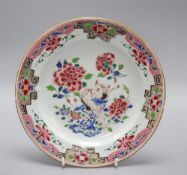 A Chinese Yongzheng famille rose dish, diameter 22cmCONDITION: Several small chips to the rim and