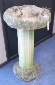 A reconstituted stone circular bird bath, H.68cm