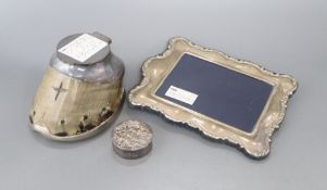 A silver photograph frame, 20.9cm, a Victorian silver patch box and a plated horse's hoof inkwell.