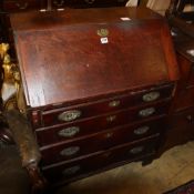 A small George III oak bureau, W.76cm, D.44cm, H.97cm