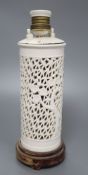 A pierced Chinese blanc de chine lamp base, height 23cm excl. fittings