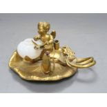 A Victorian ormolu 'cherub' inkstand, length 20cmCONDITION: Did not have a lid, the cherub's body