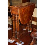 A late Victorian burr walnut Sutherland table, W.52cm, D.15cm, H.53cm